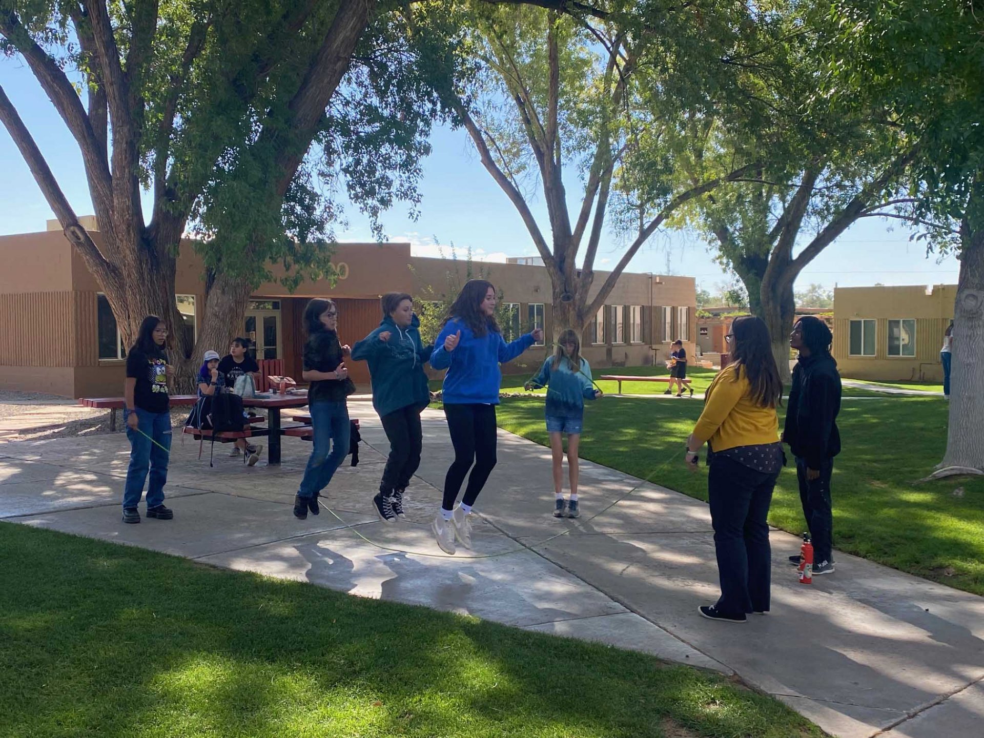 Students play jump rope during lunch