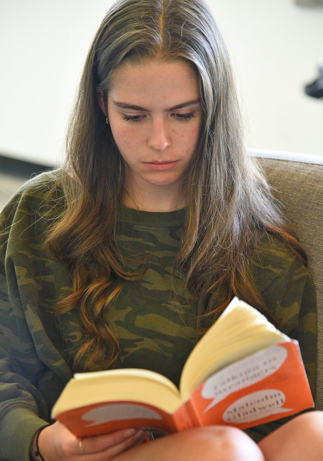 Student reading a novel