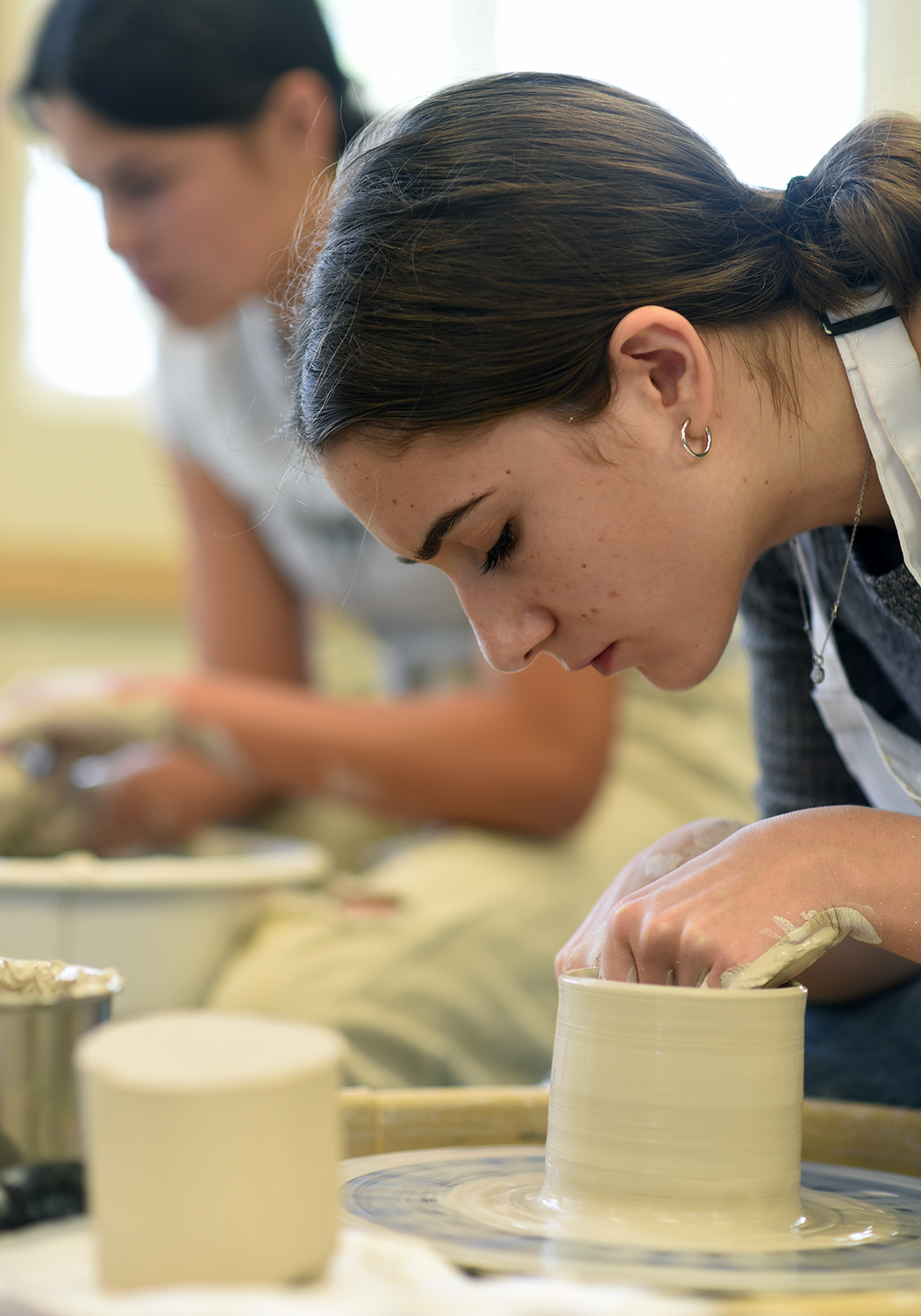Students in clay class