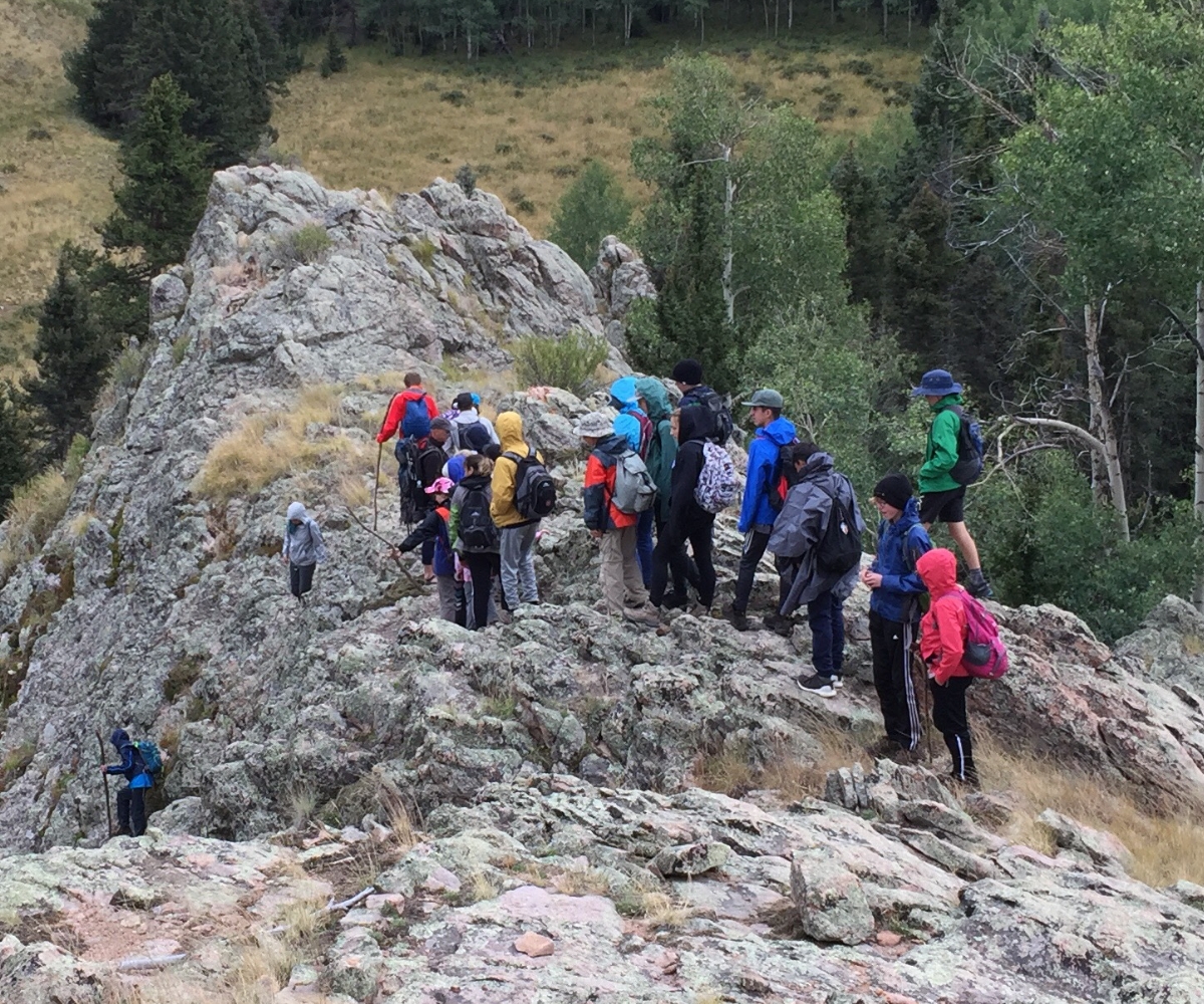 Line of student hiking