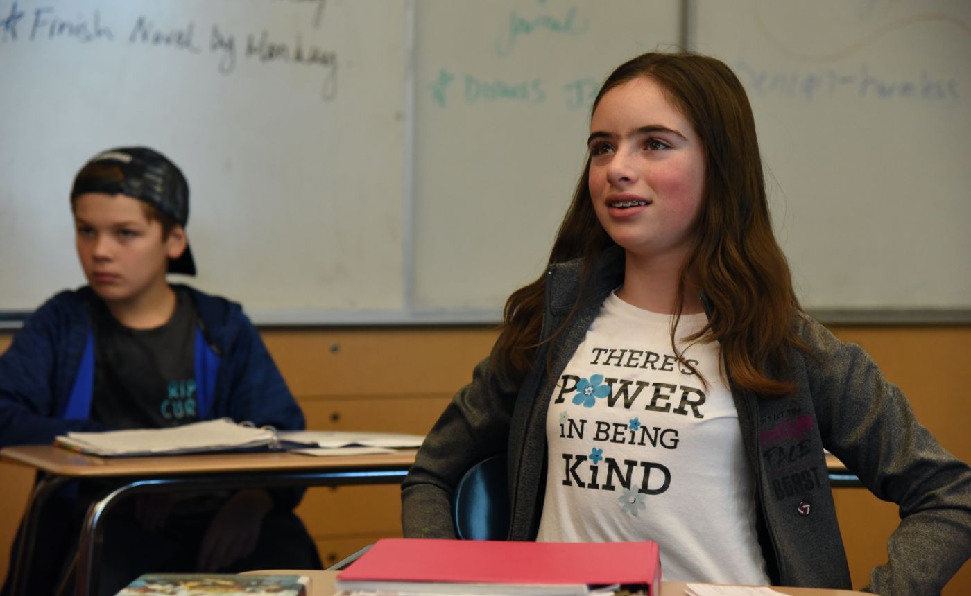 Student with kindness shirt