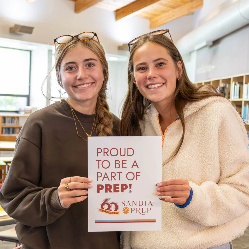 Students with Proud Prep sign