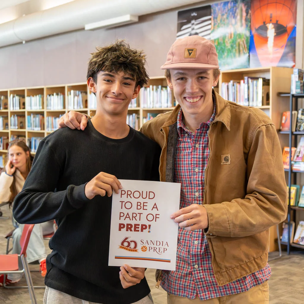 Students with Proud Prep sign