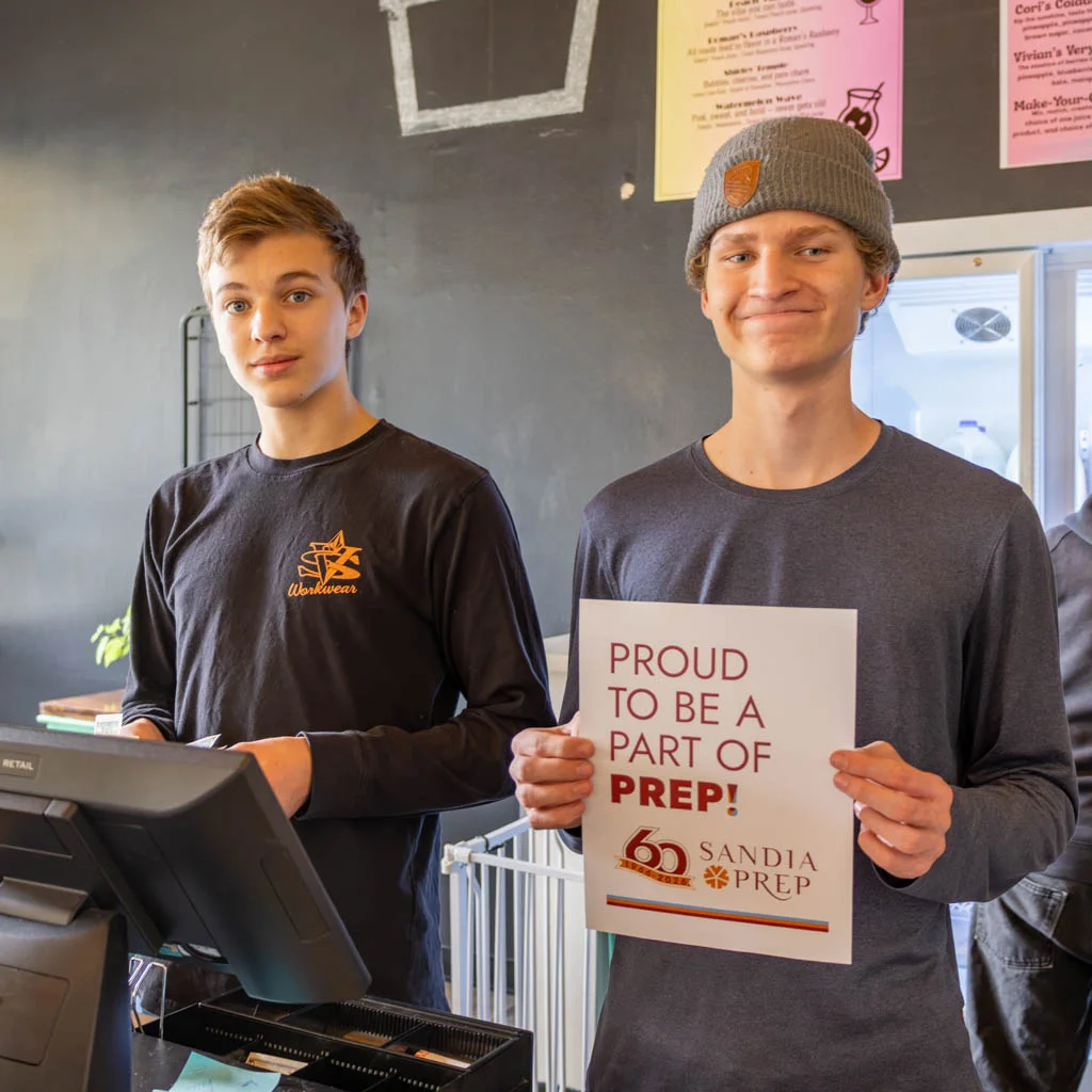 Students with Proud Prep sign