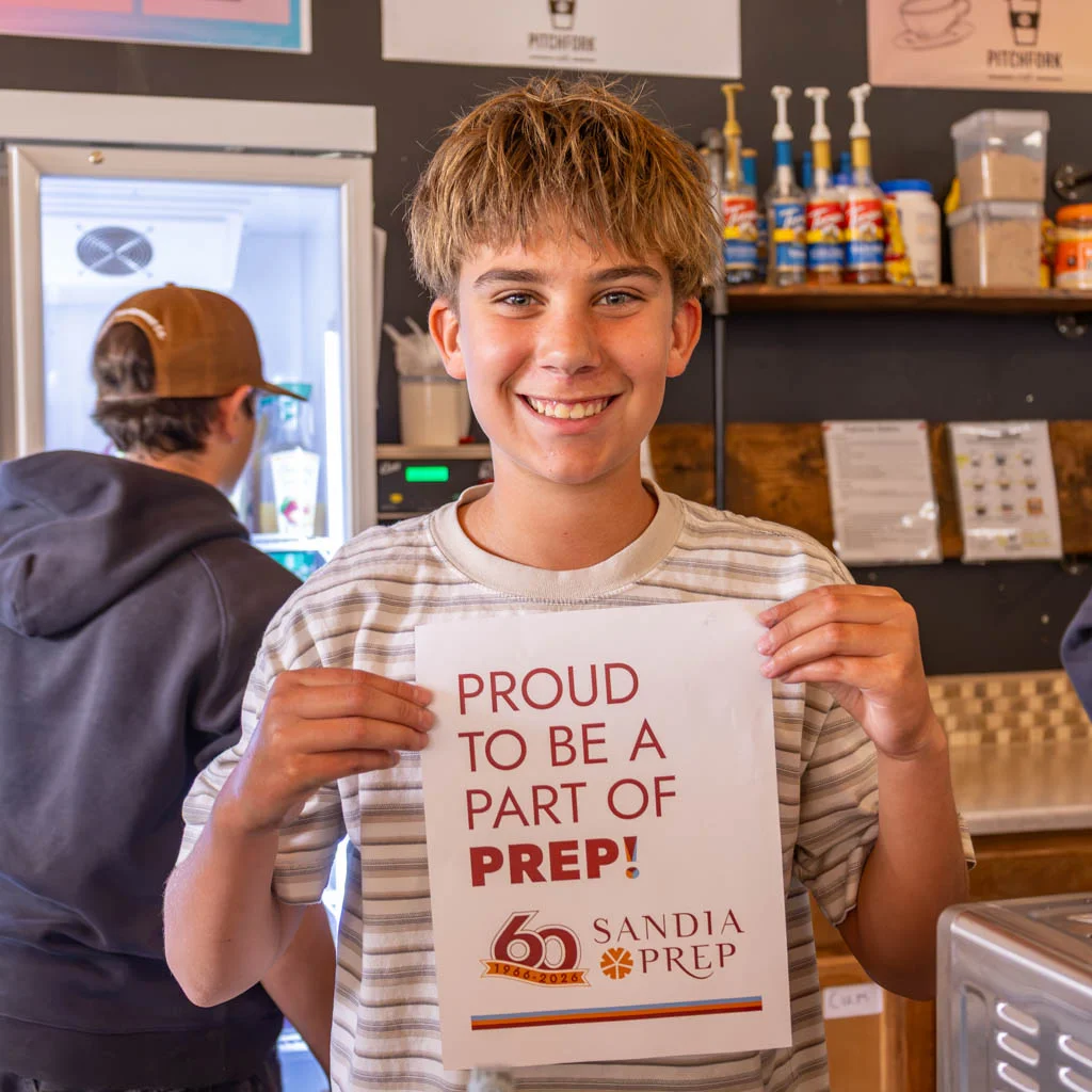 Student with Proud Prep sign