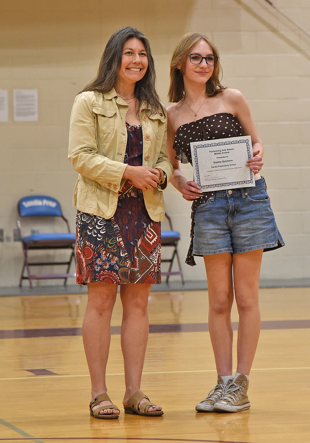 Student receiving award