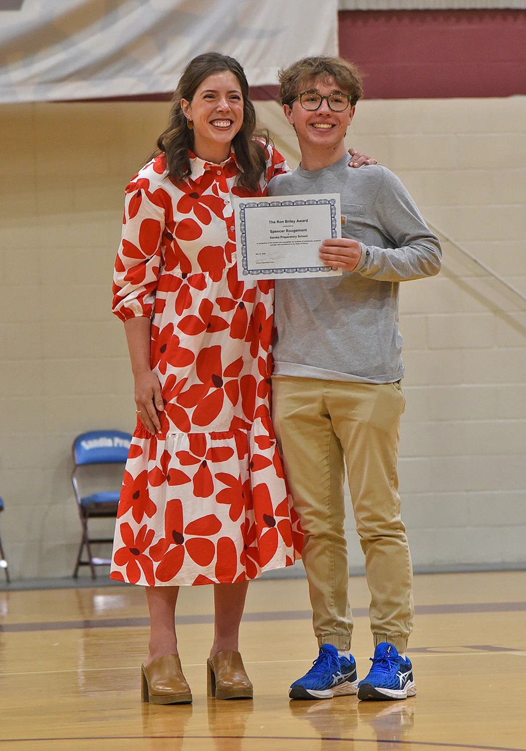 Student receiving award