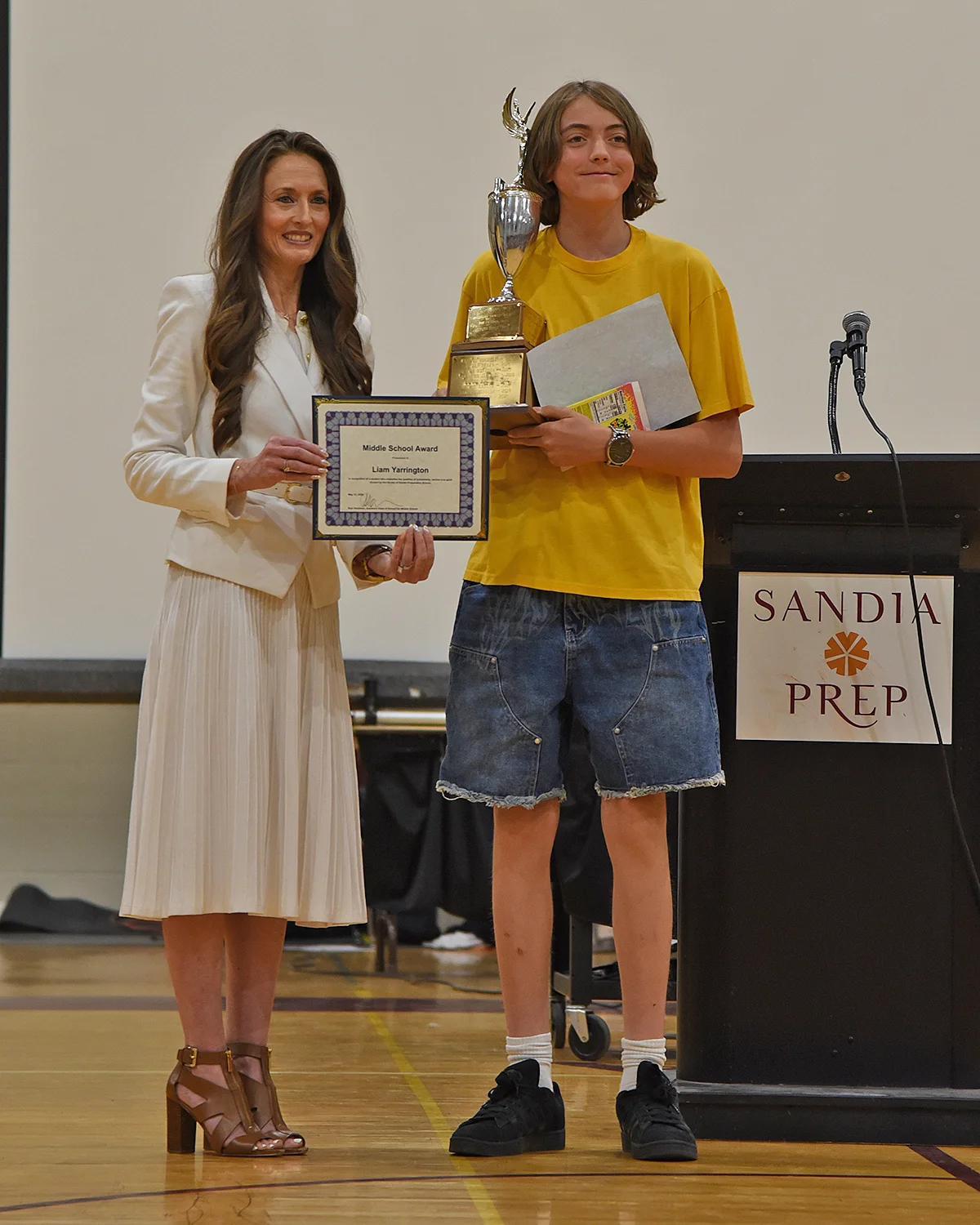 Student receiving award