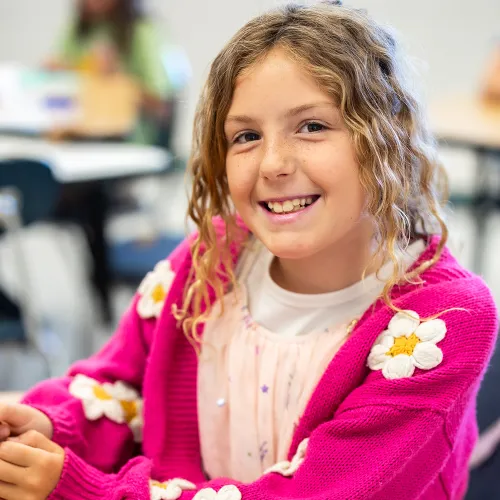 Camper smiling at camera