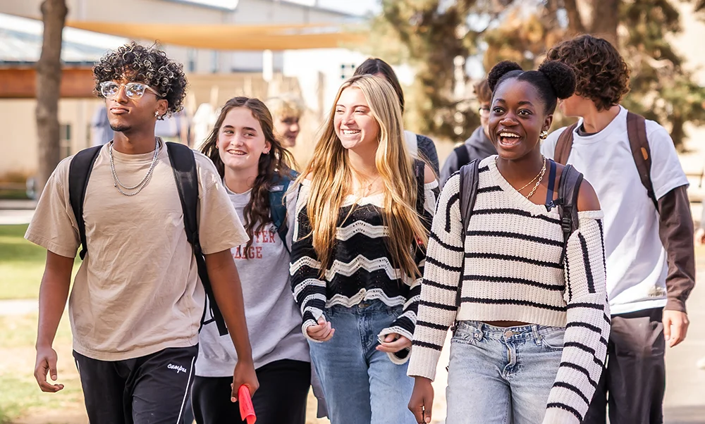 Group of students walking on quad