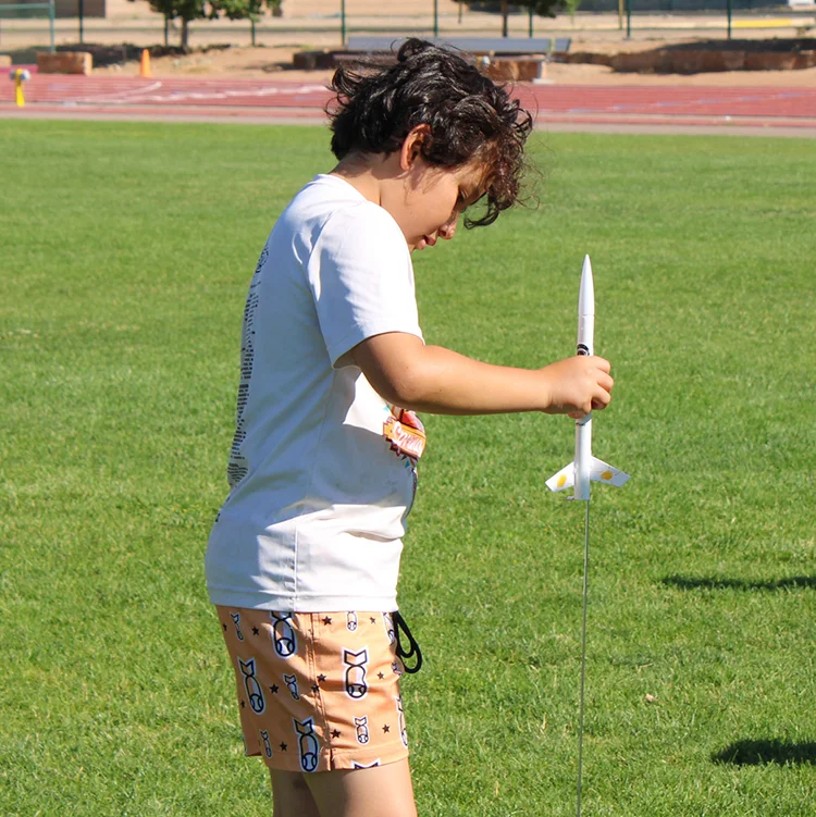 camper setting up rocket