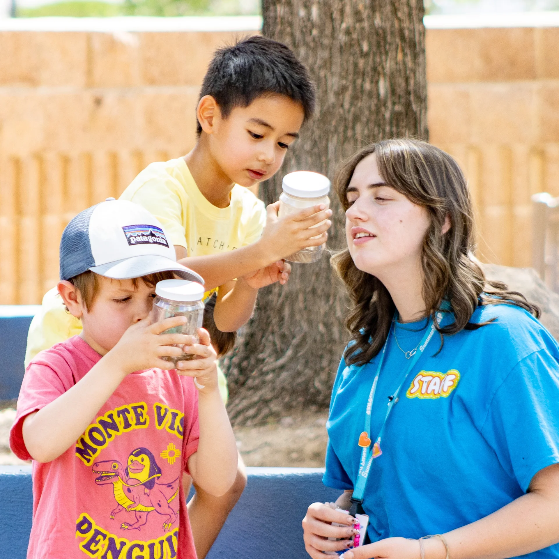 two campers with counselor