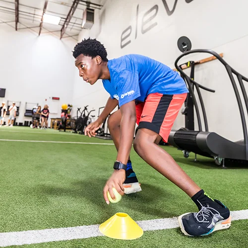 camper doing drill at Elevate Gym 