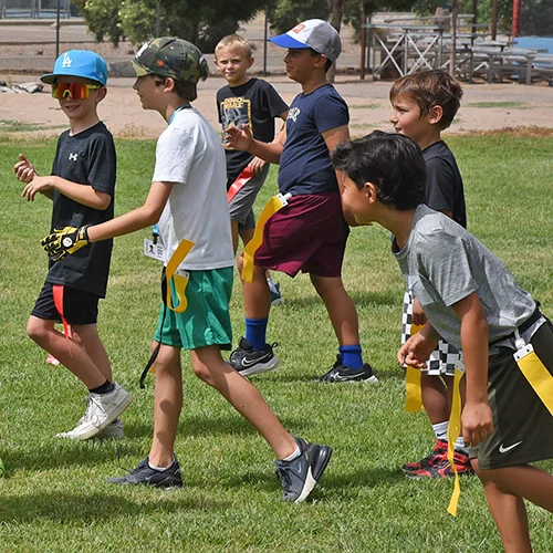 Flag football campers playing