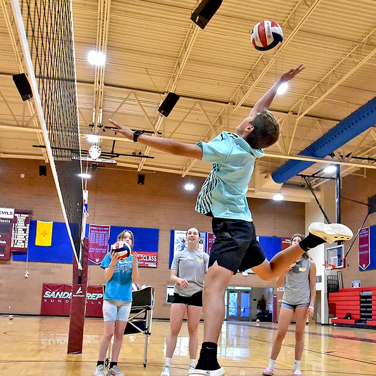 camper hitting volleyball