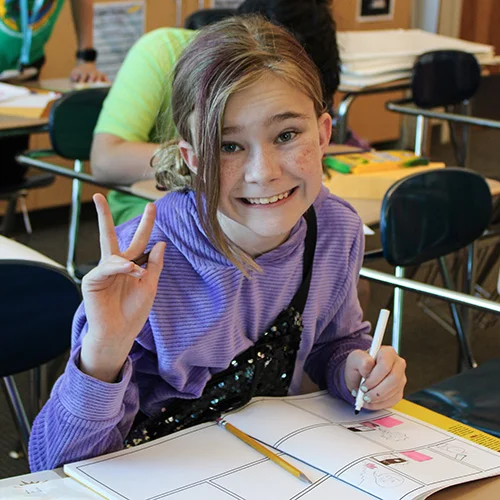 camper flashing peace sign