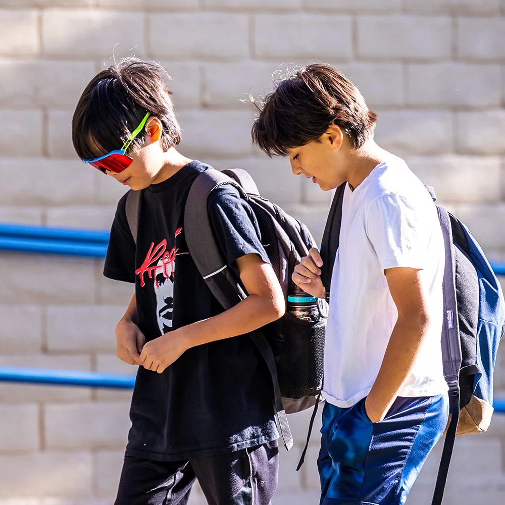 two students walking together