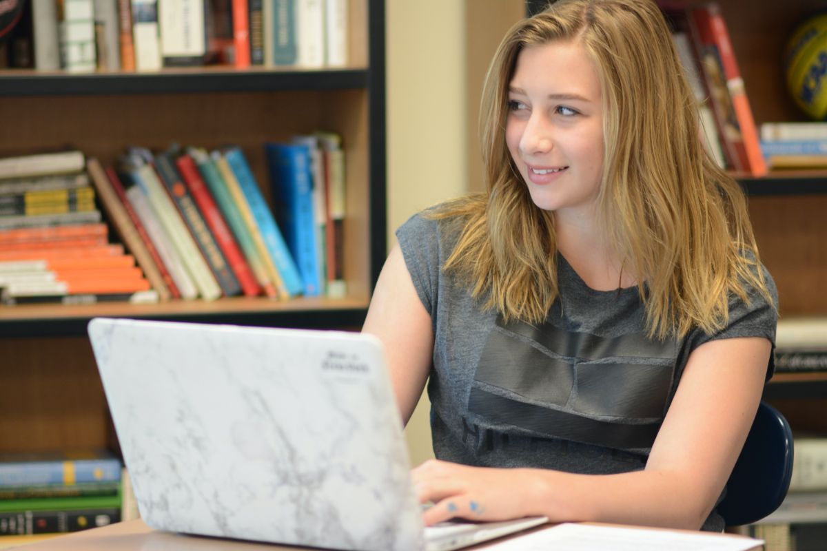 High school student on laptop