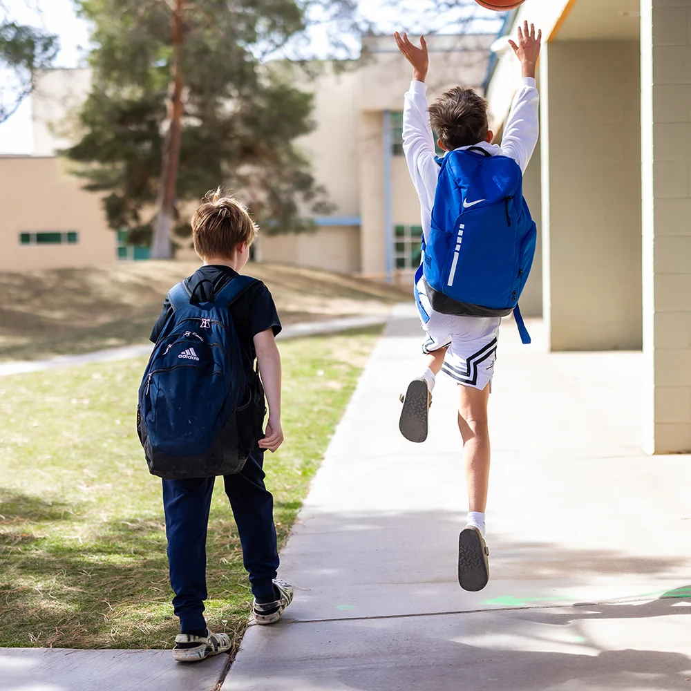 Student jumping in Quad