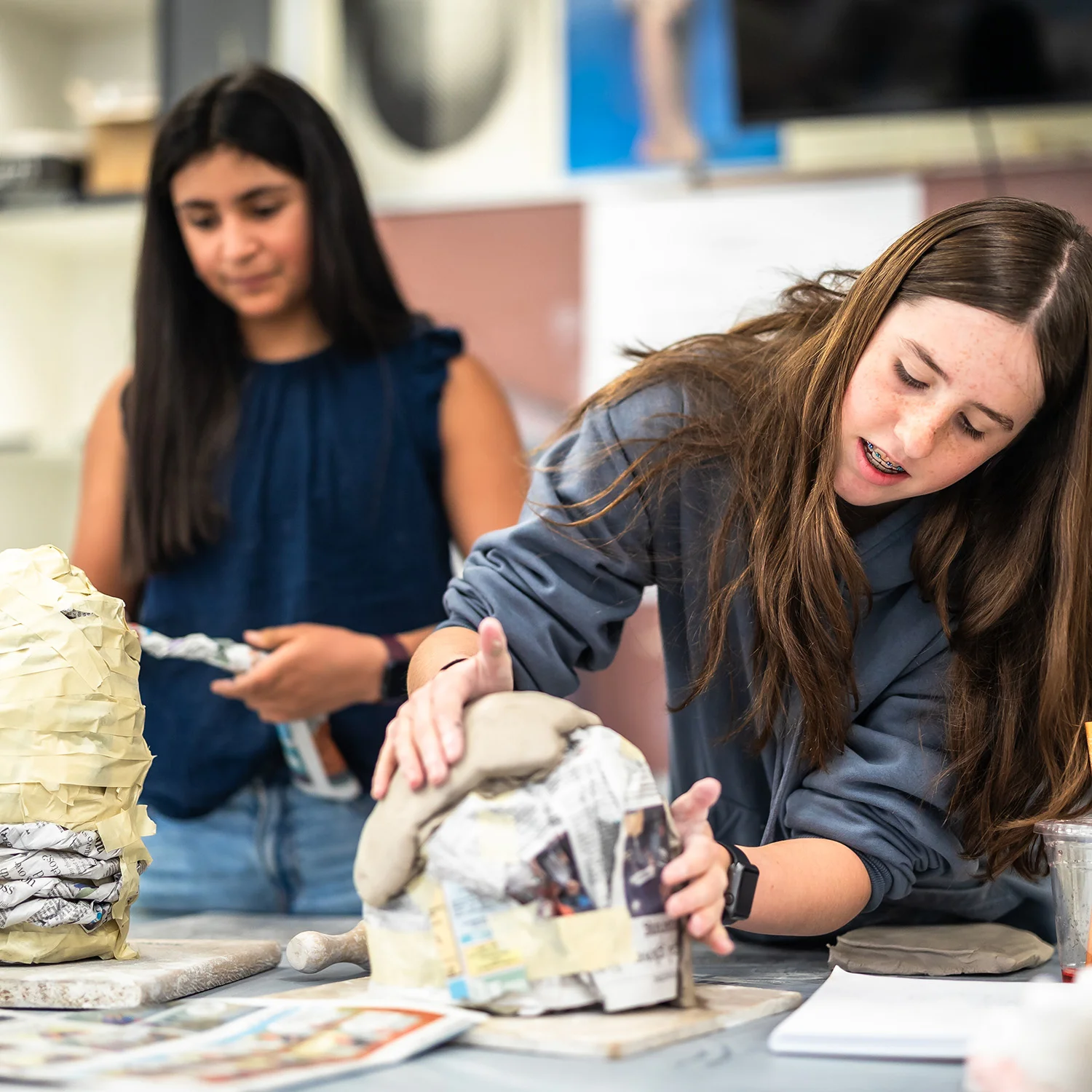 students in clay studio - open house