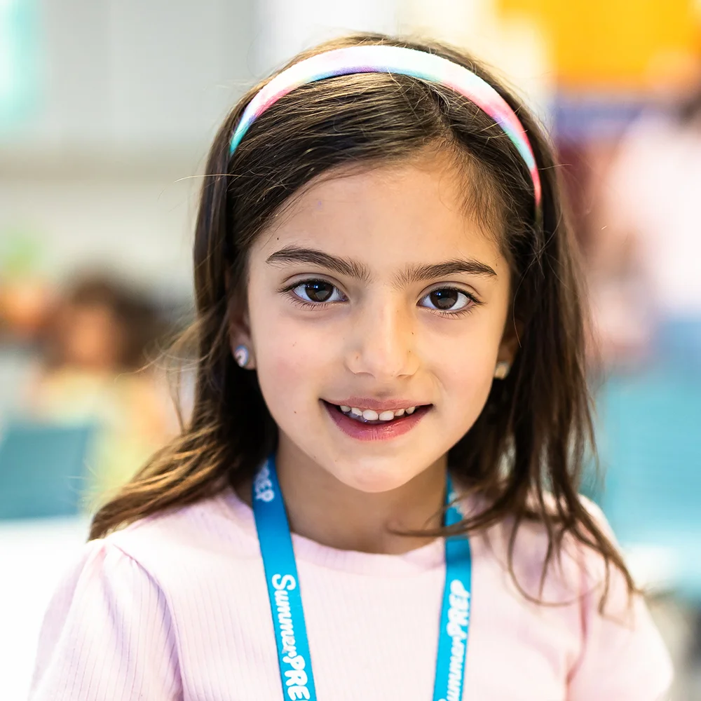 summerprep camper smiling at camera