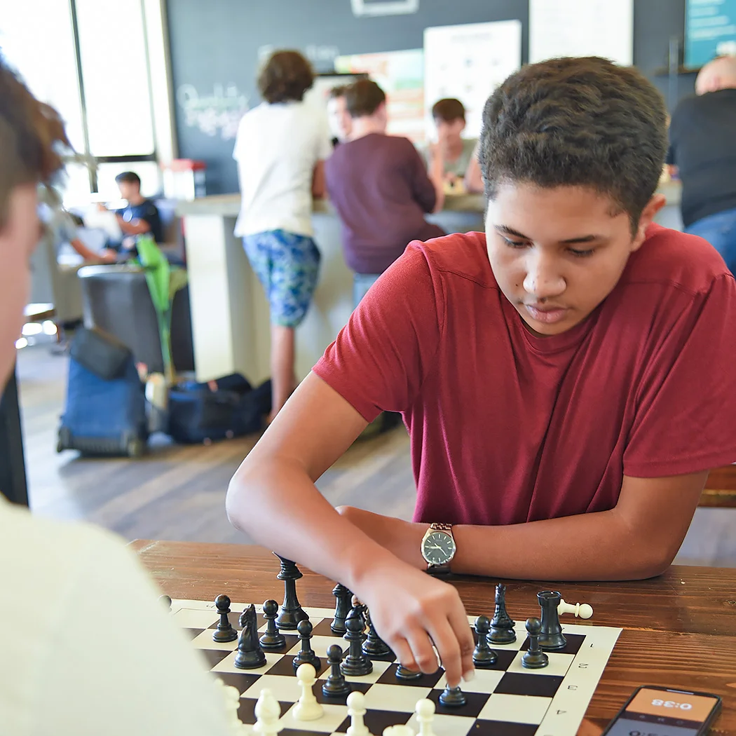 student playing chess