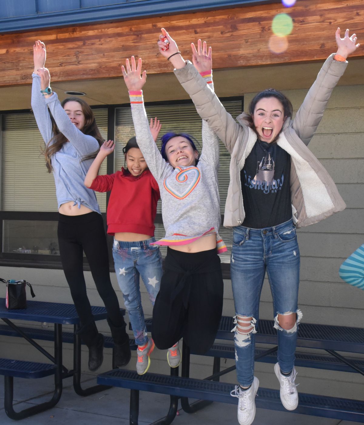 Students jumping in air